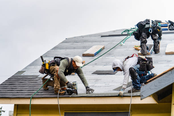 Professional Gutter Installation technician working in Benton, KY